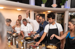 men and women in a cooking class